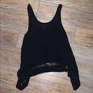 Black asymmetrical tank with lace trim